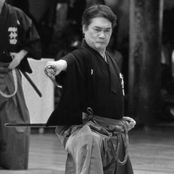 Kazuhisa Kaneda Sensei performing iaidō, sword extended